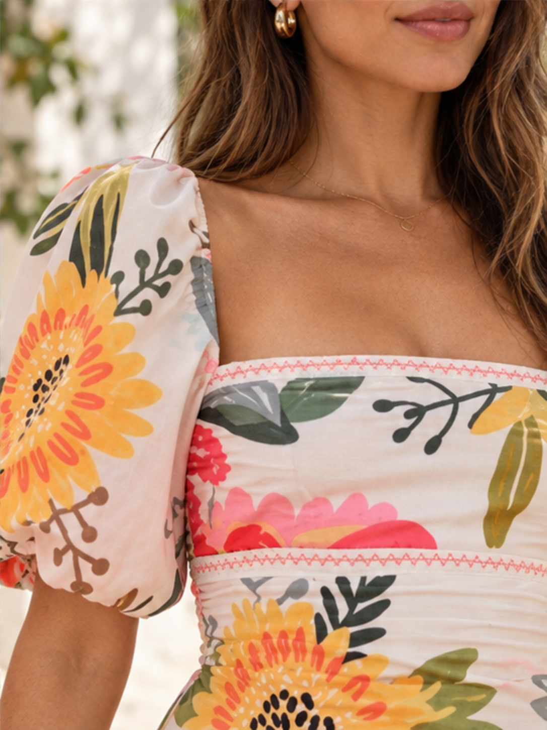 Floral print puff-sleeve maxi dress in watermelon pink floral, close-up of print, square neckline, puff sleeve and ruched construction