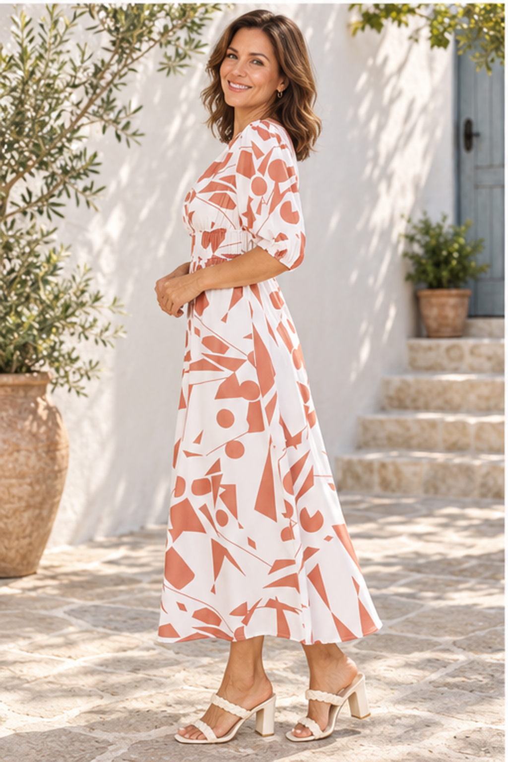 Printed surplice balloon sleeve dress in camel, side profile view