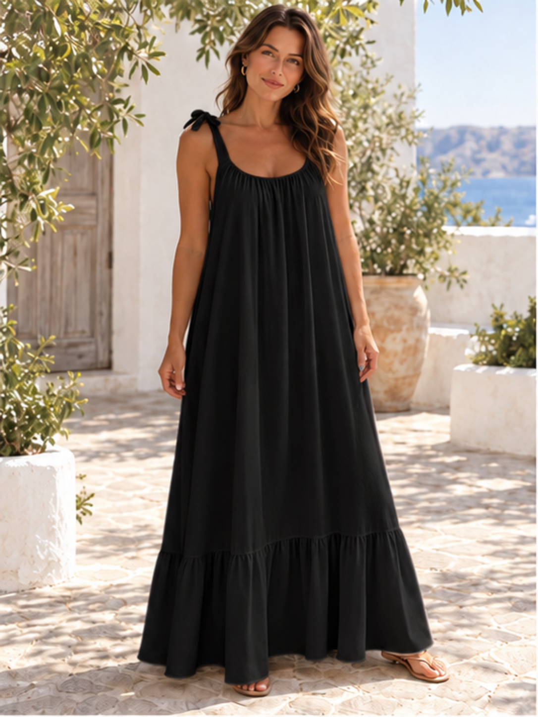 Sleeveless tie-strap flowy maxi dress in black, front full-length view