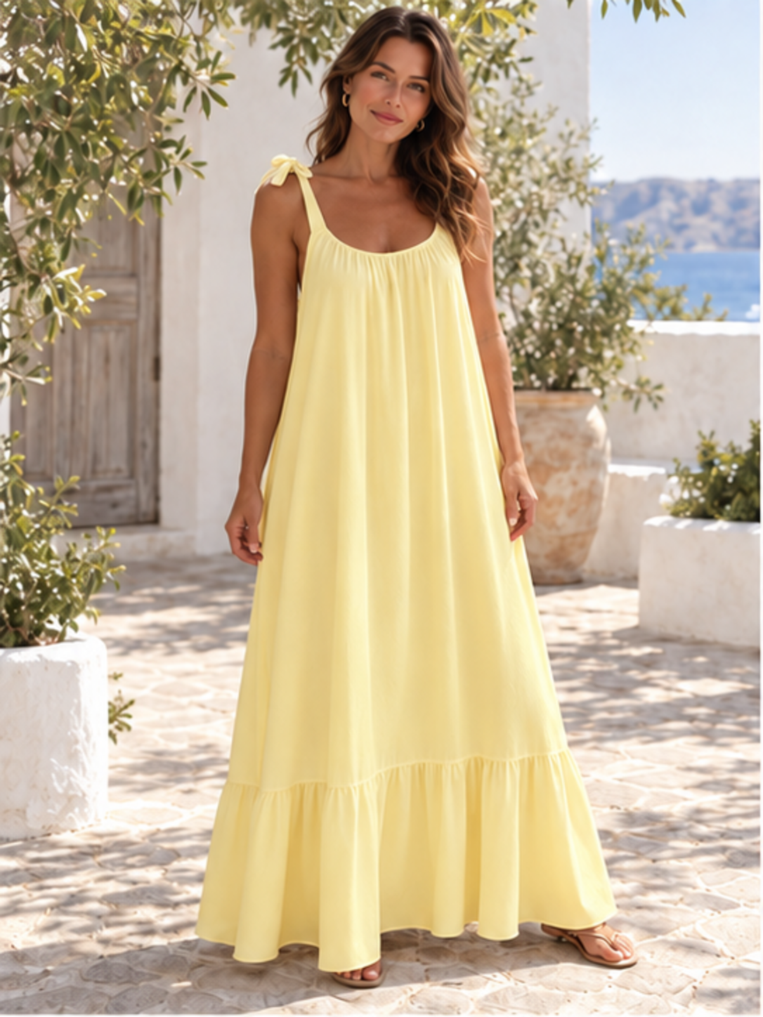 Sleeveless tie-strap flowy maxi dress in yellow, front full-length view